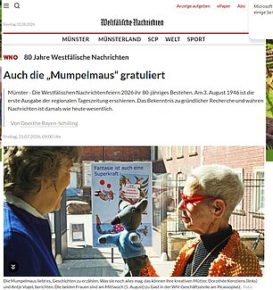 Zeitungsausschnitt aus der WN online mit der Überschrift "Auch die Mumpelmaus gratuliert". . Ein Bild mit den Autorinnen Dorothée Kerstiens und Antje Vogel und ihrer Kinderbuchfigur, der "Mumpelmaus", als Handpuppe.